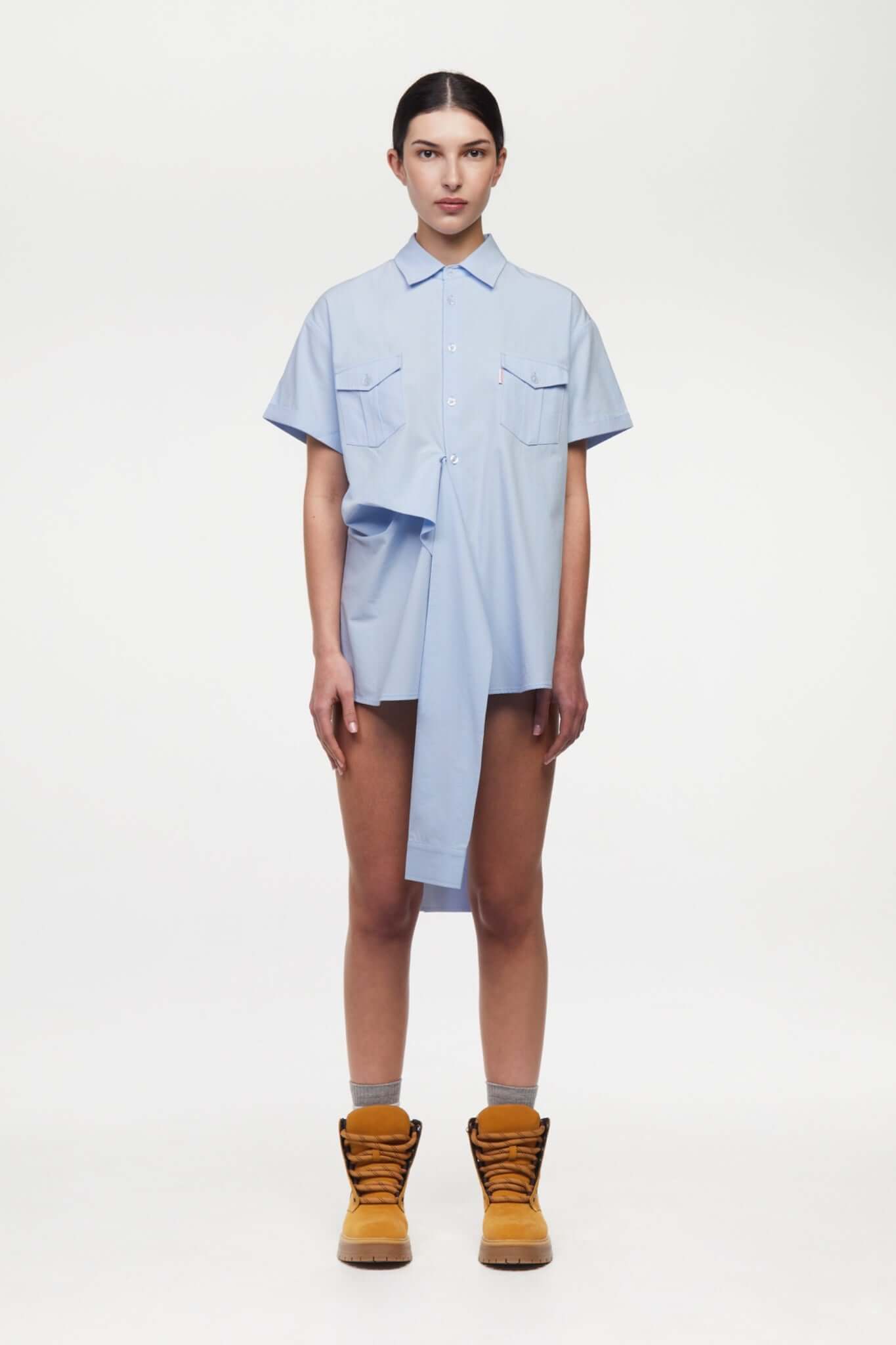 Blue shirt with 4 sleeves making a tie waist 
