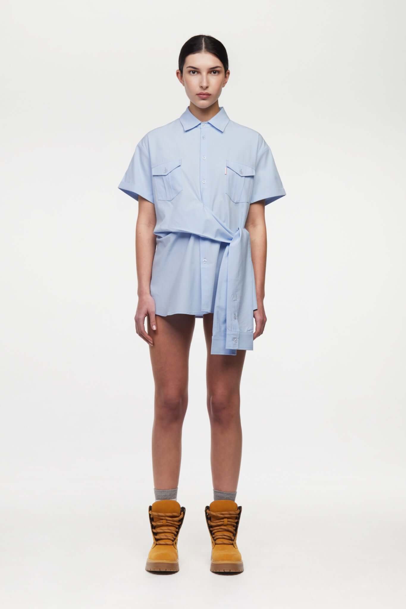 Blue shirt with 4 sleeves making a tie waist 
