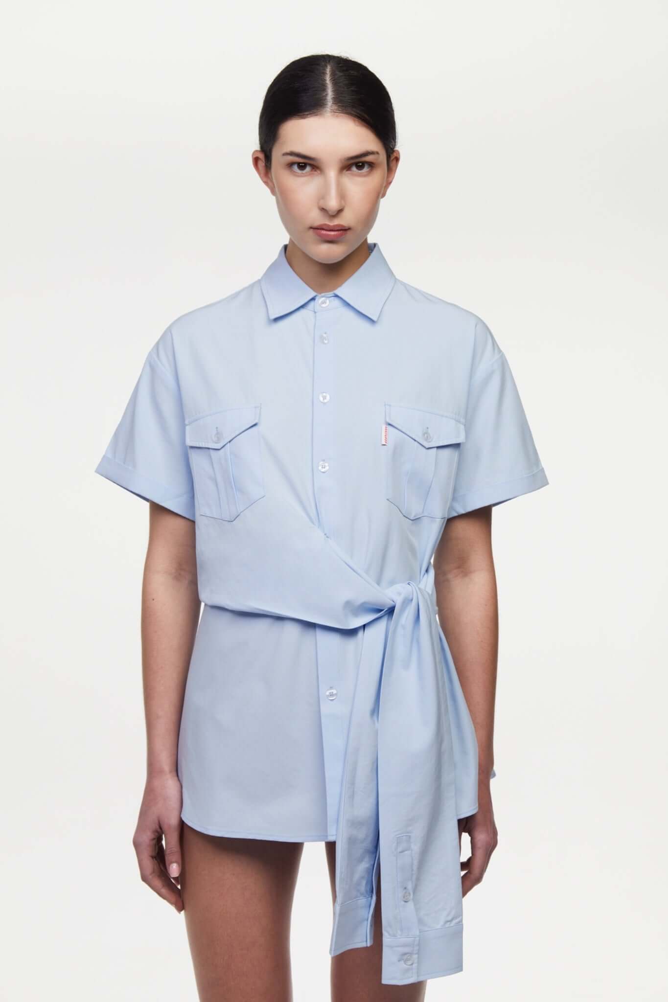 Blue shirt with 4 sleeves making a tie waist 
