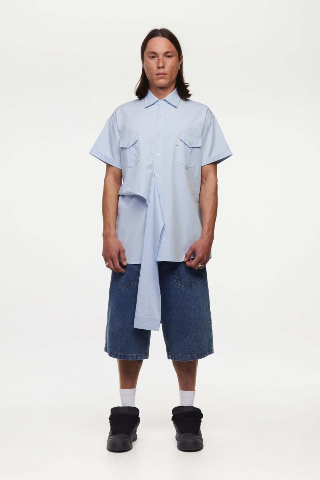 Blue shirt with 4 sleeves making a tie waist 
