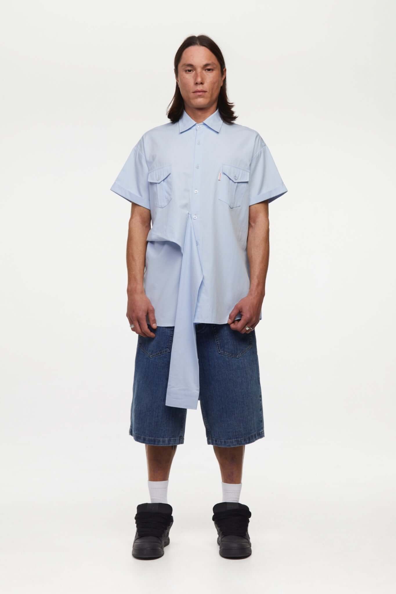 Blue shirt with 4 sleeves making a tie waist 
