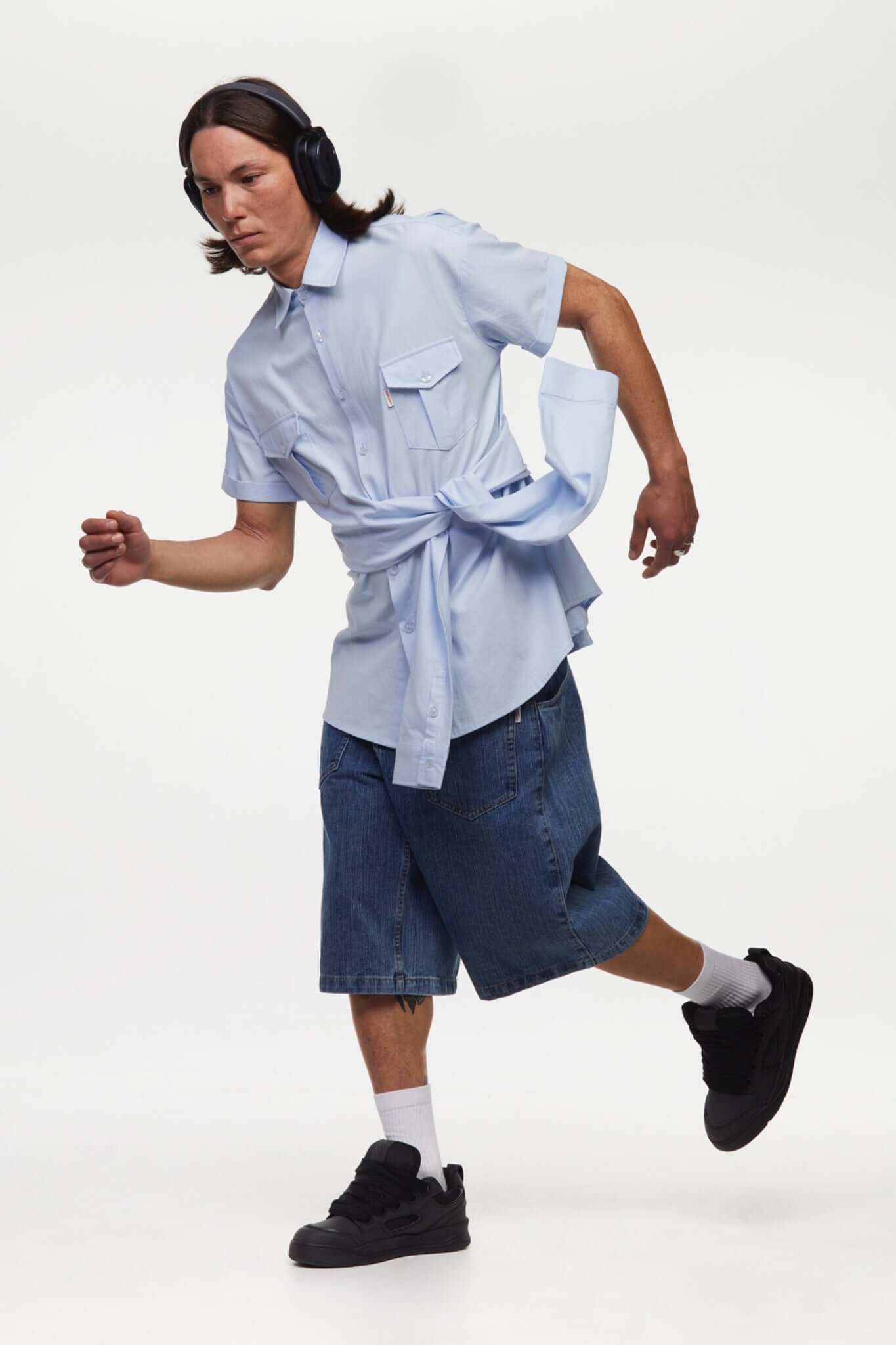 Blue shirt with 4 sleeves making a tie waist 
