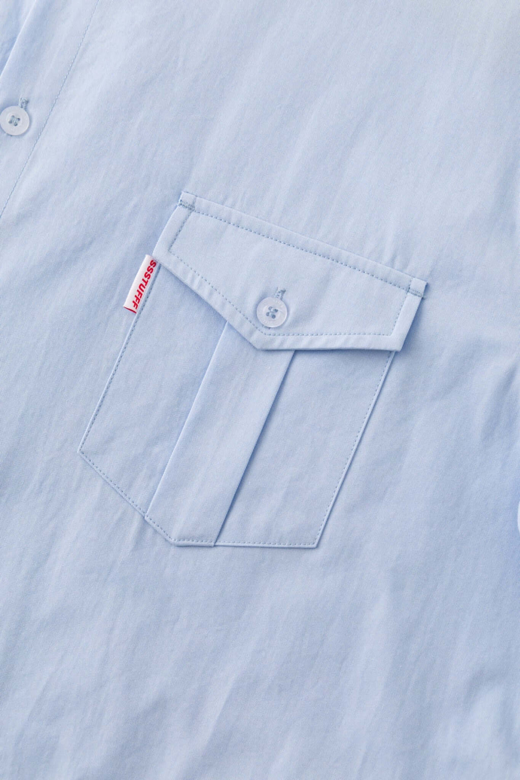 Blue shirt with 4 sleeves making a tie waist 
