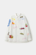 White shirt with colorful graphics simulating a plaster 