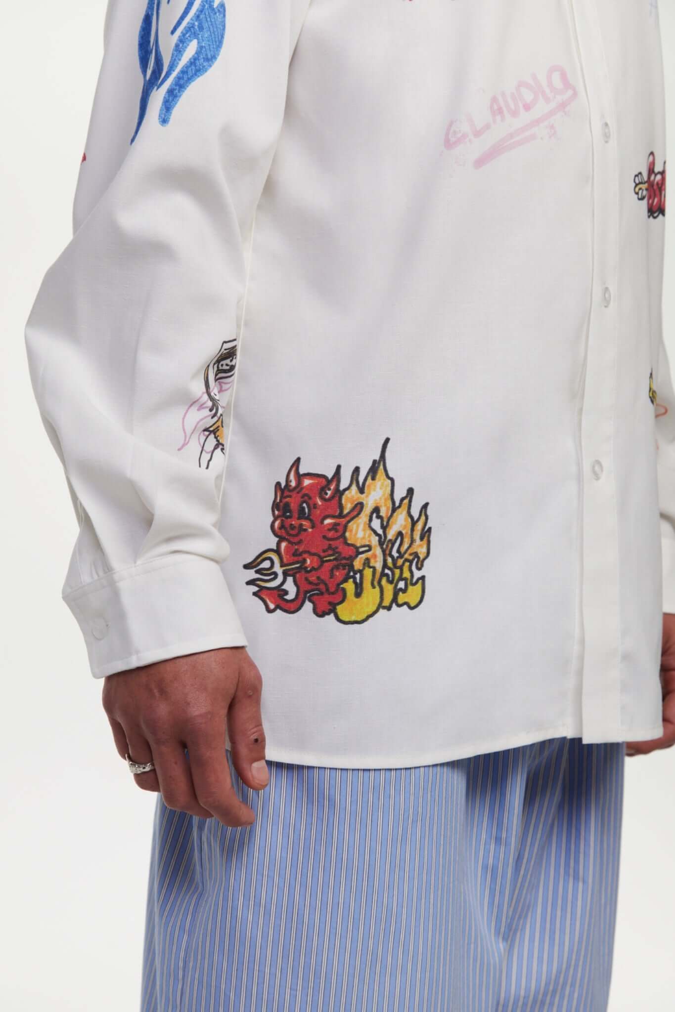 White shirt with colorful graphics simulating a plaster 

