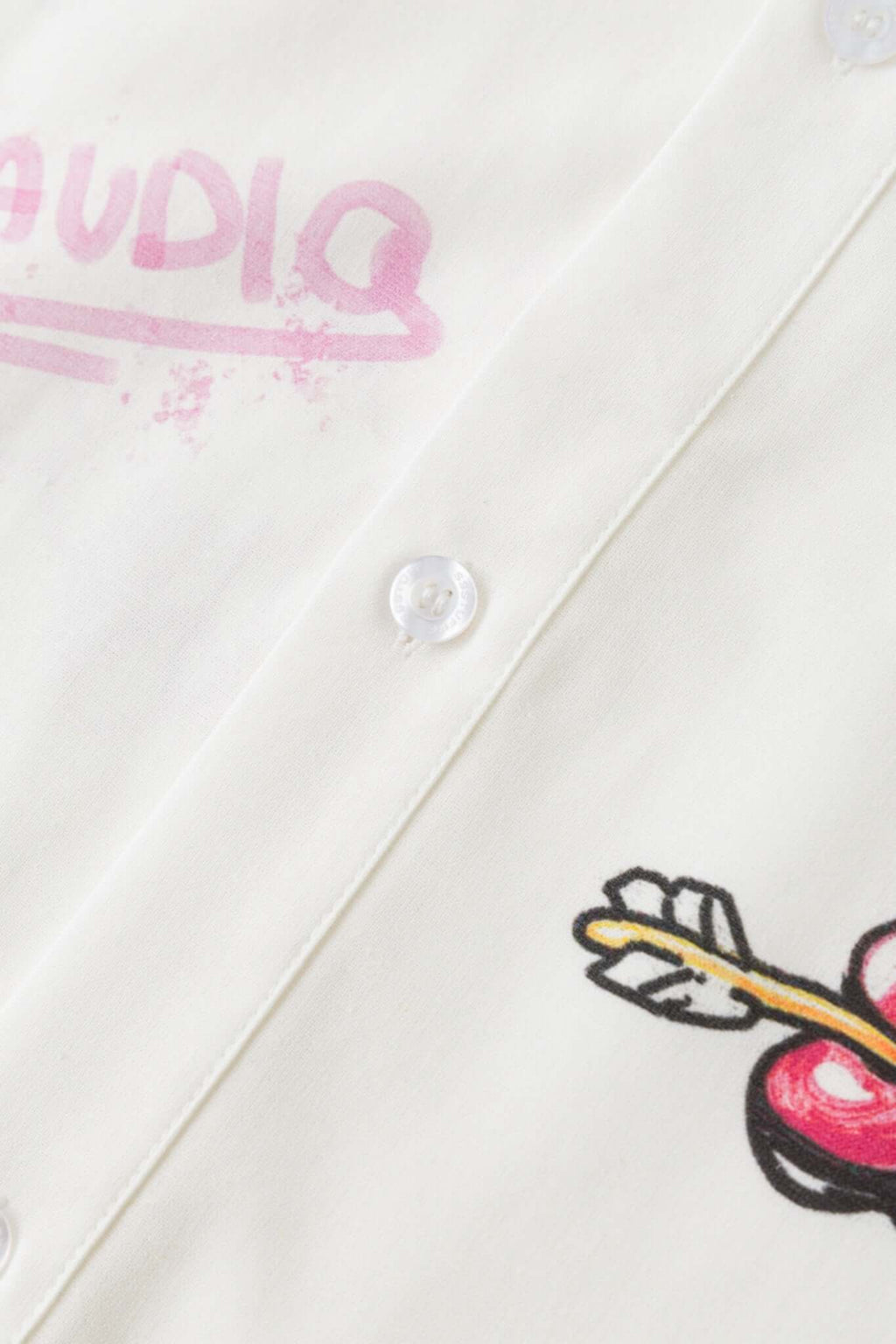 White shirt with colorful graphics simulating a plaster 
