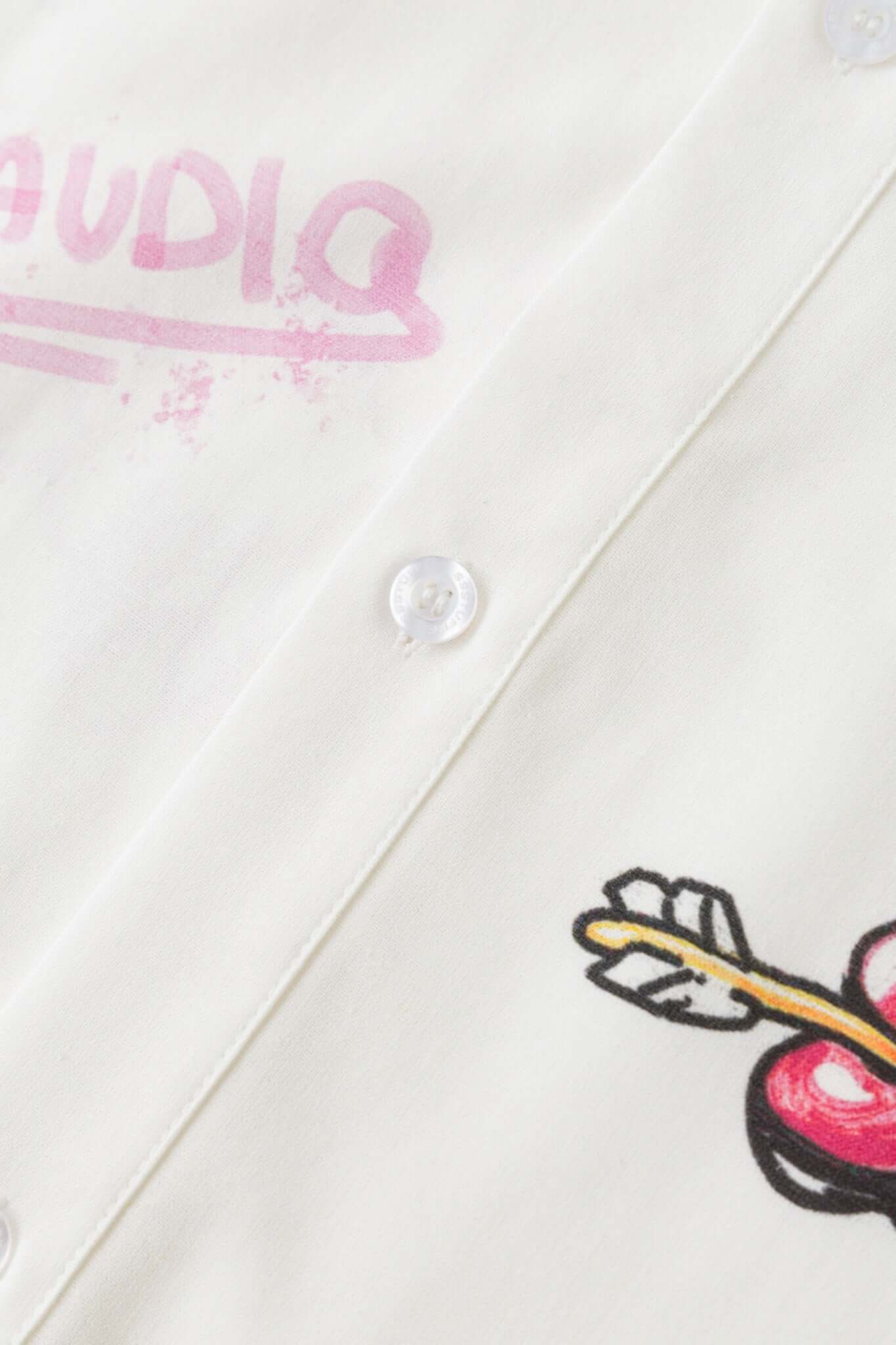 White shirt with colorful graphics simulating a plaster 
