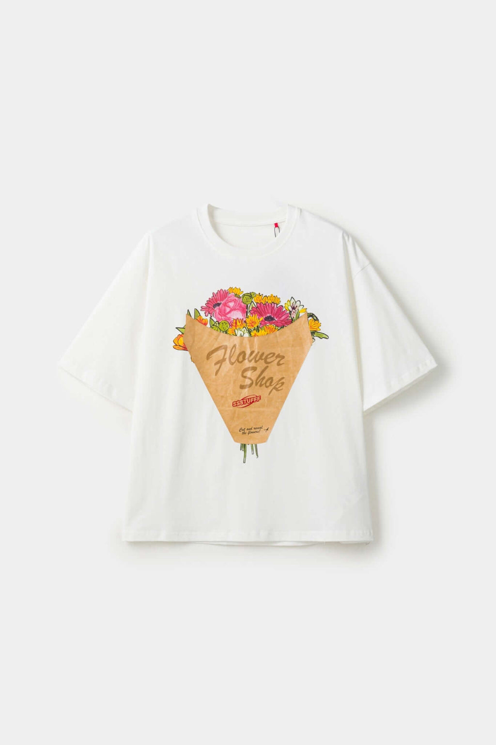 White t-shirt with a graphic of a flower shop cone that you can break 