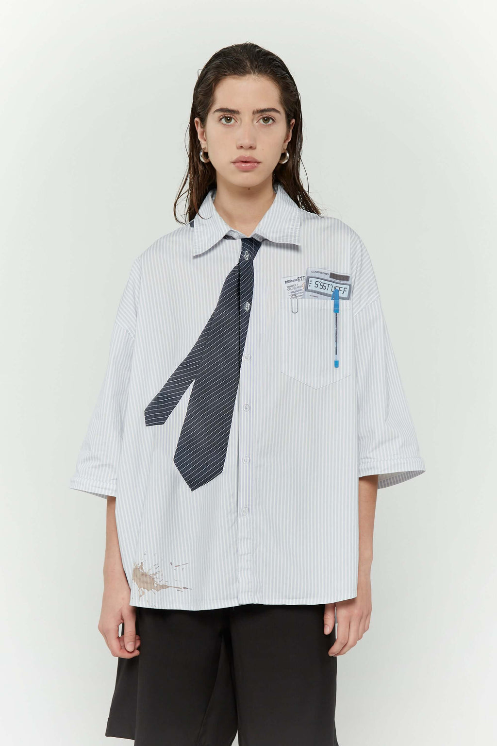 Light blue stripes shirt with a black tie graphic 
