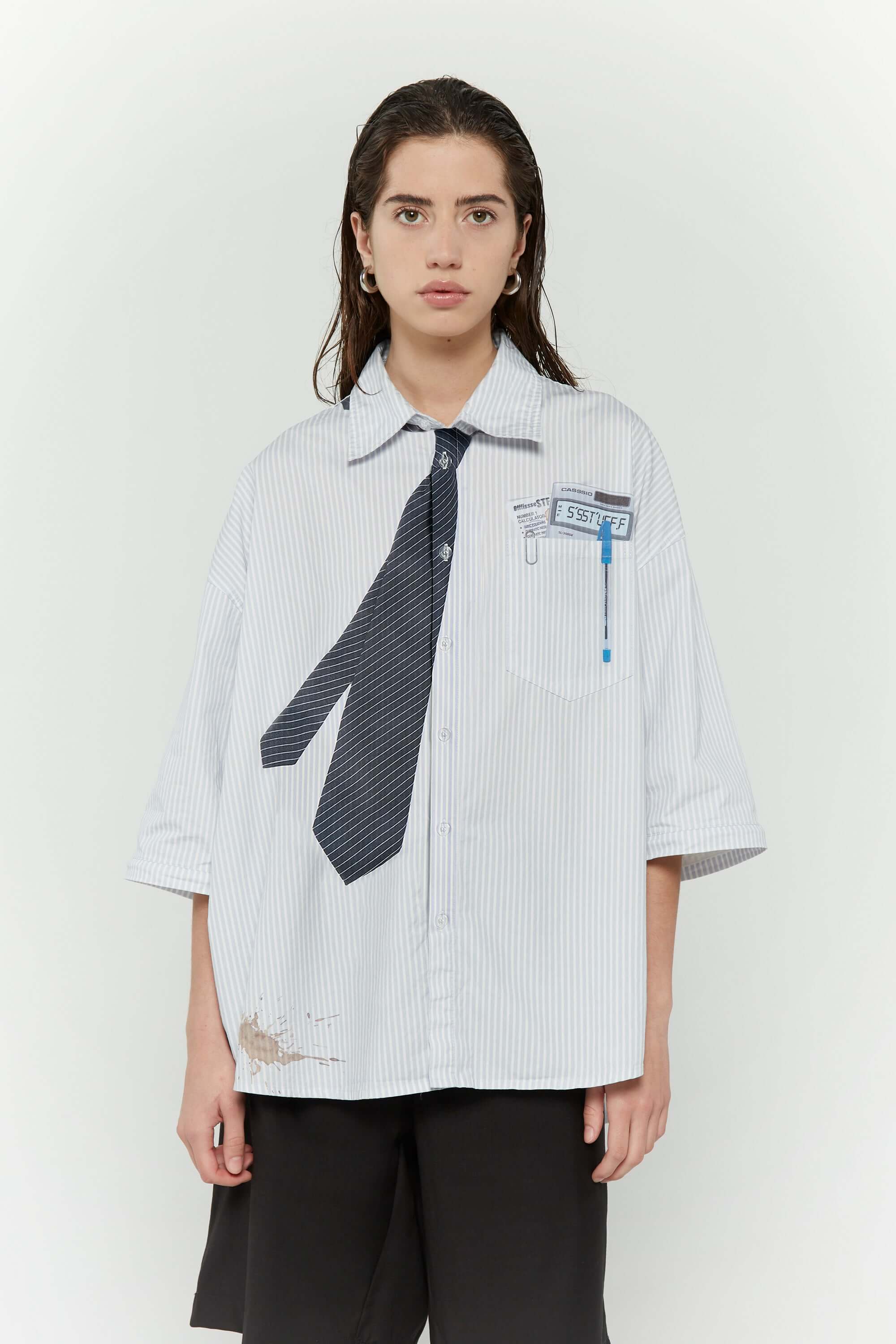 Light blue stripes shirt with a black tie graphic 
