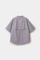 Grey checkered shirt with a red logo and red details in the zipper
