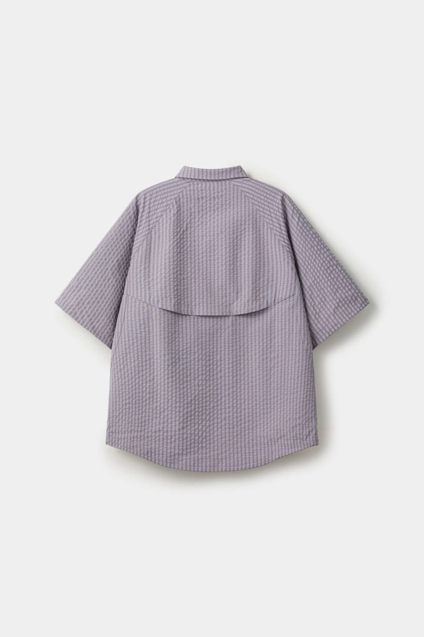 Grey checkered shirt with a red logo and red details in the zipper
