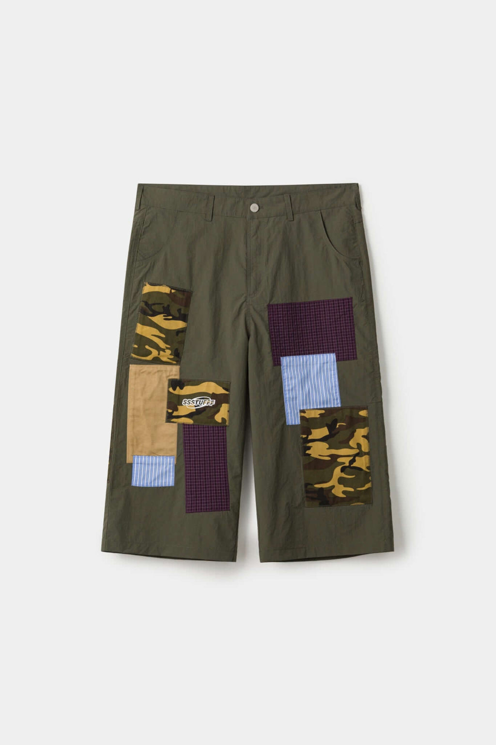 Green patchwork pants with various patterns 