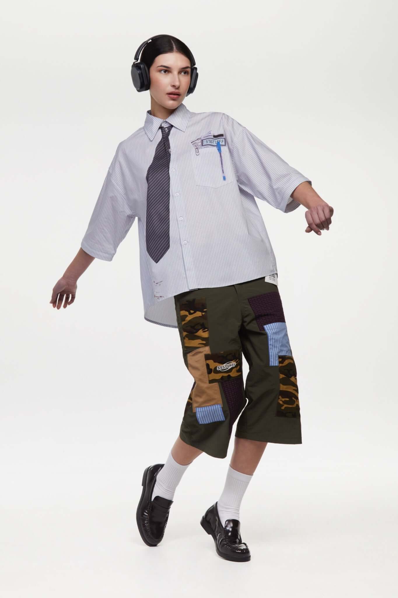 Green patchwork pants with various patterns 