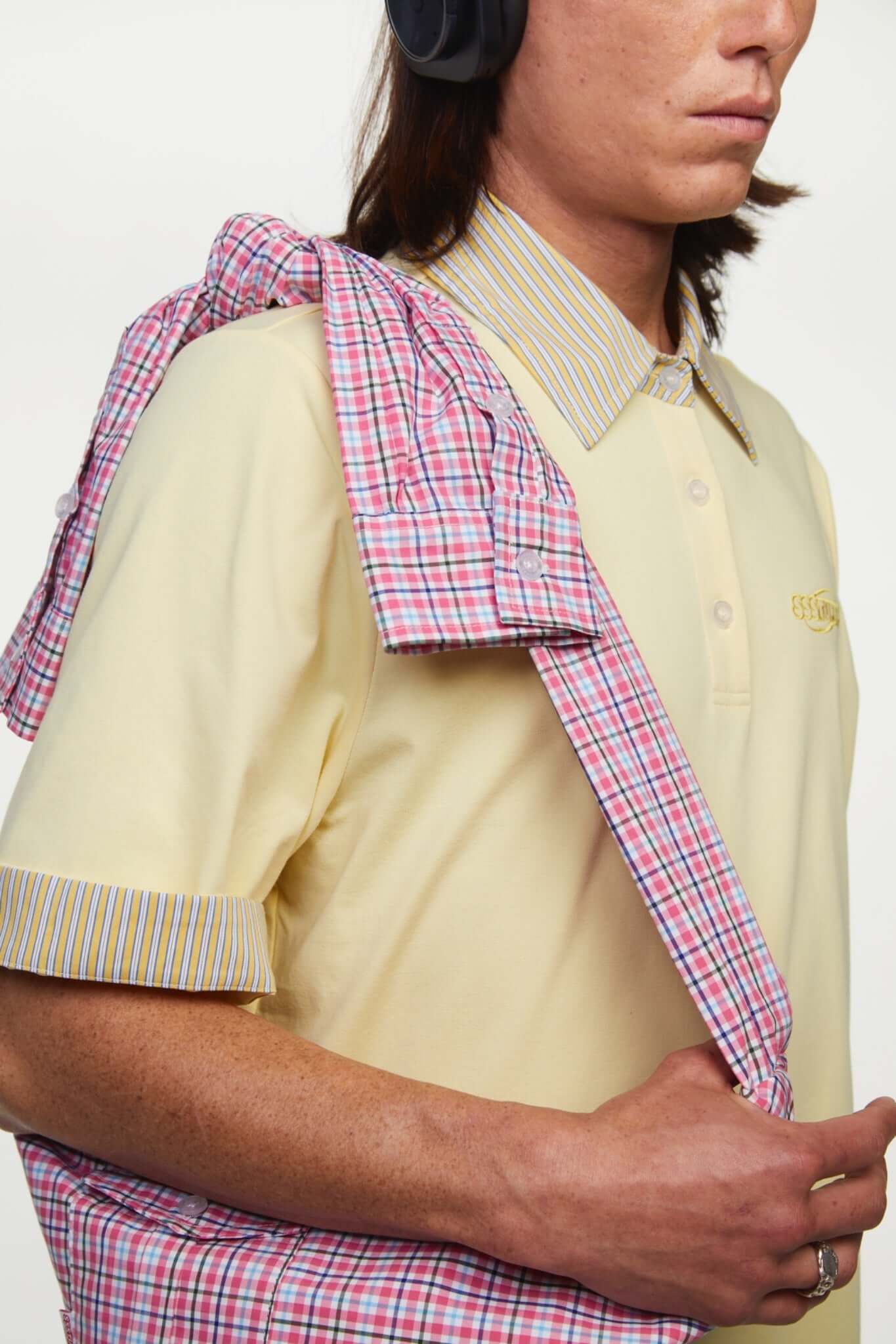 Pink plaid bag with a strap simulating a shirt
