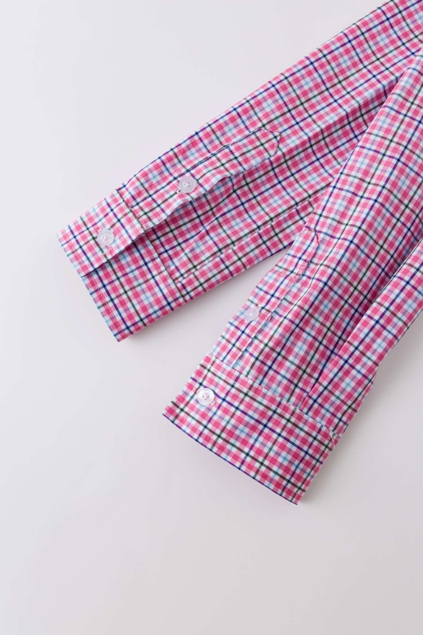 Pink plaid bag with a strap simulating a shirt
