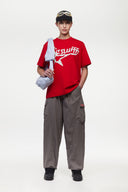 Red t-shirt with white SSSTUFFF logo and a star
