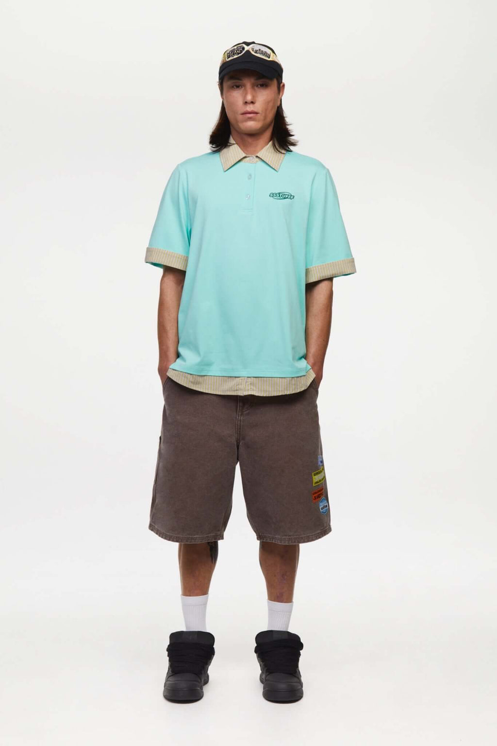 Turquoise polo shirt with checkered collar and sleeves