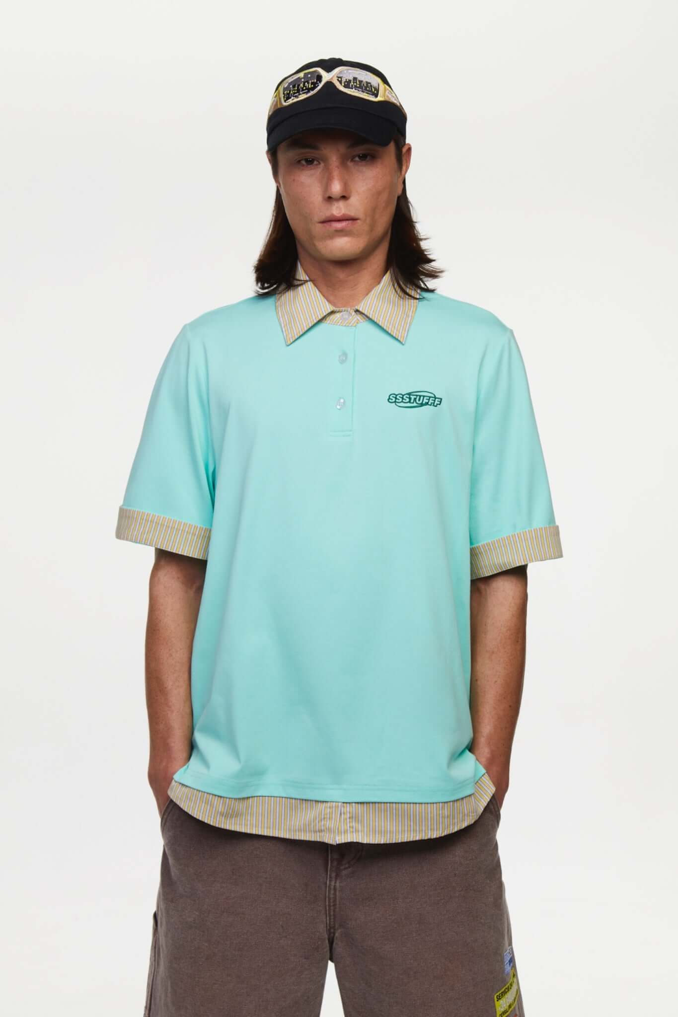 Turquoise polo shirt with checkered collar and sleeves