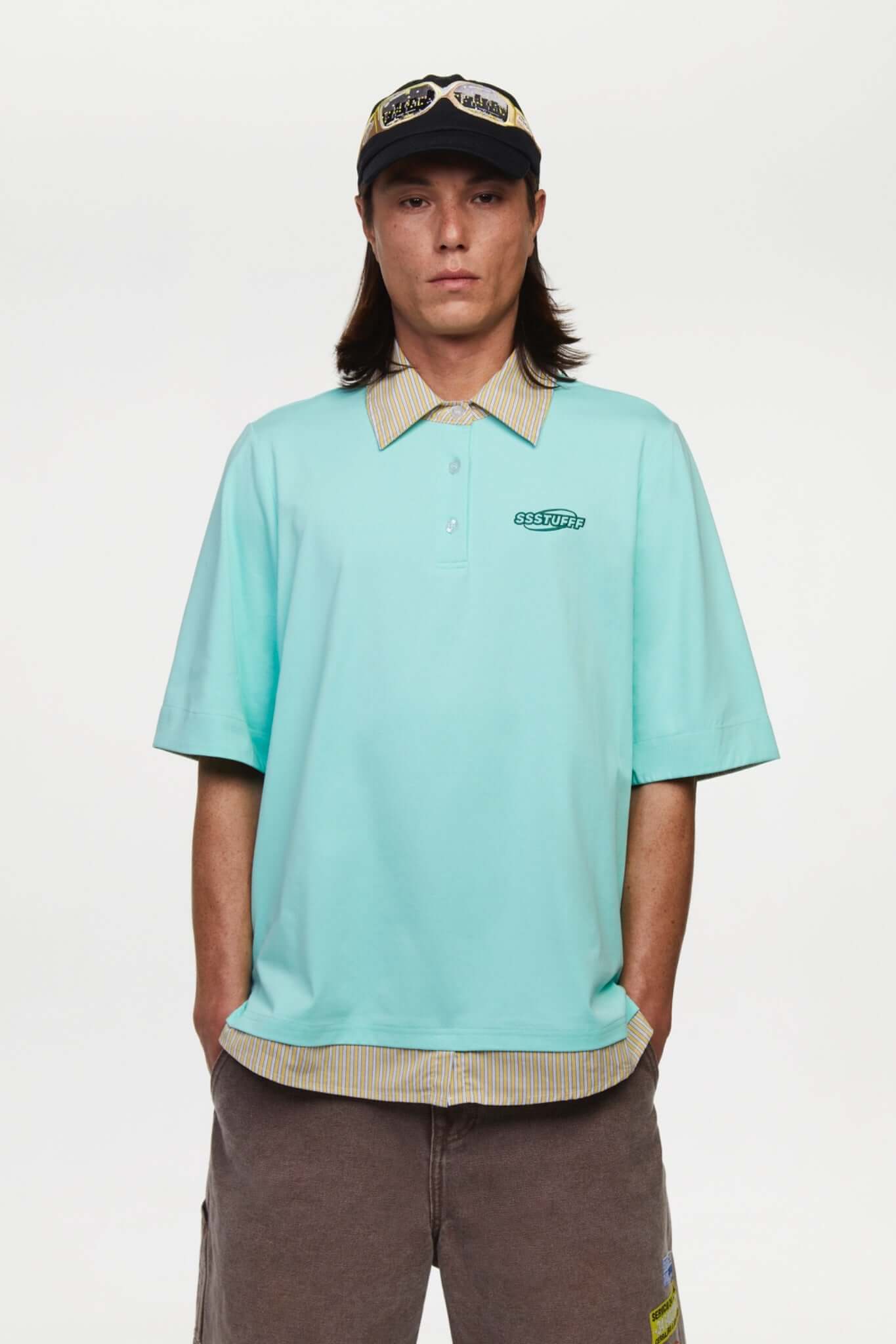 Turquoise polo shirt with checkered collar and sleeves