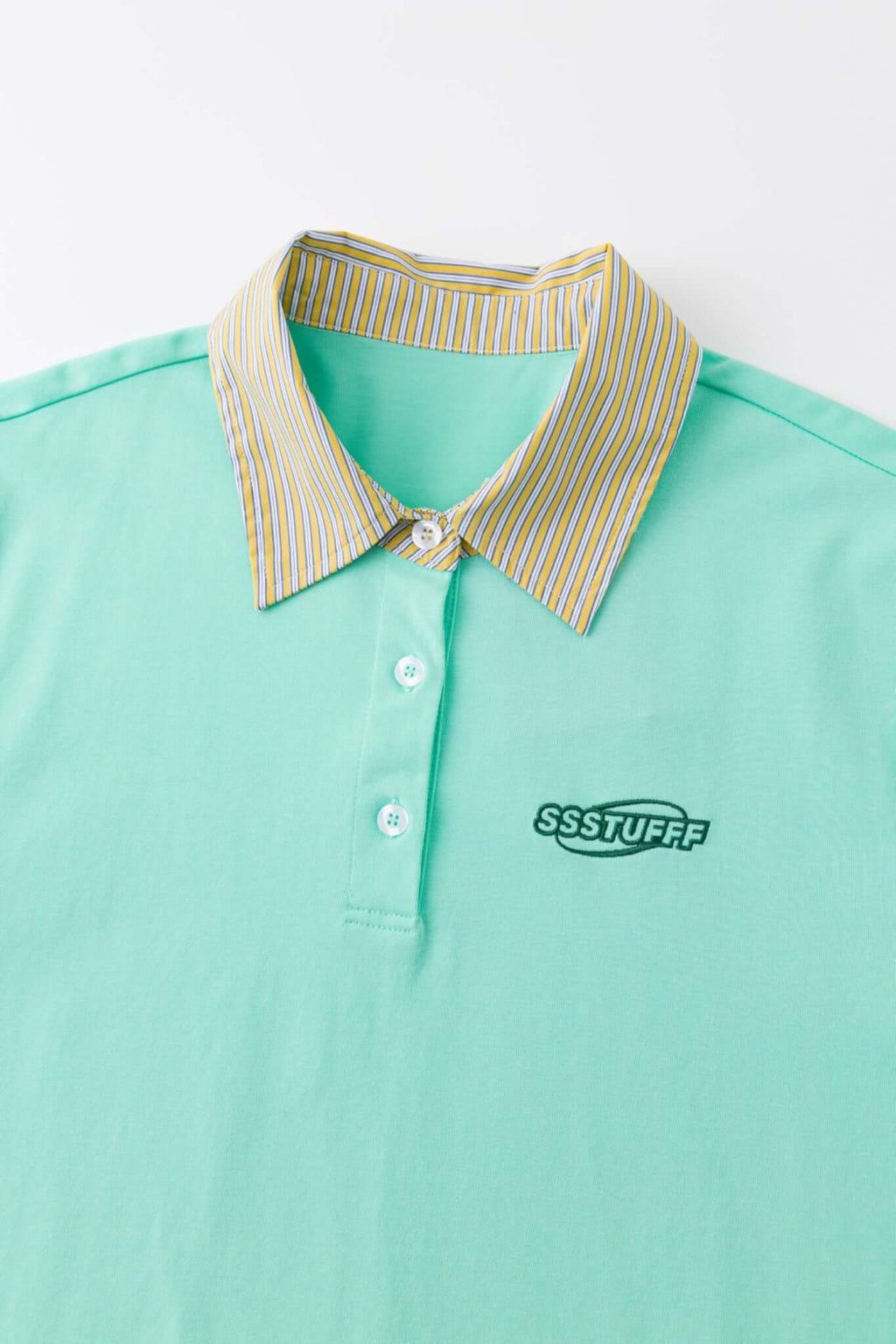 Turquoise polo shirt with checkered collar and sleeves