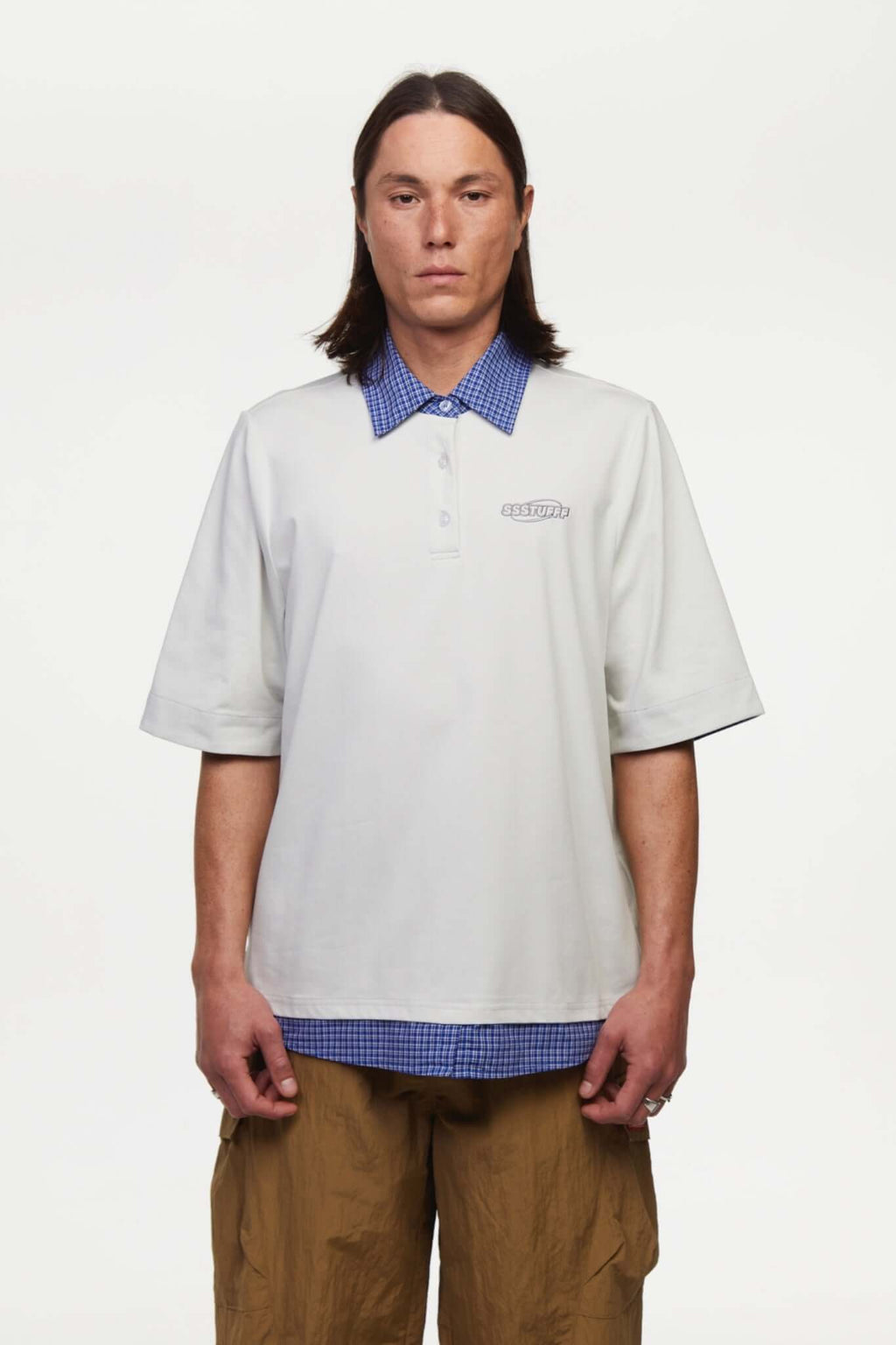 White polo shirt with checkered collar and sleeves
