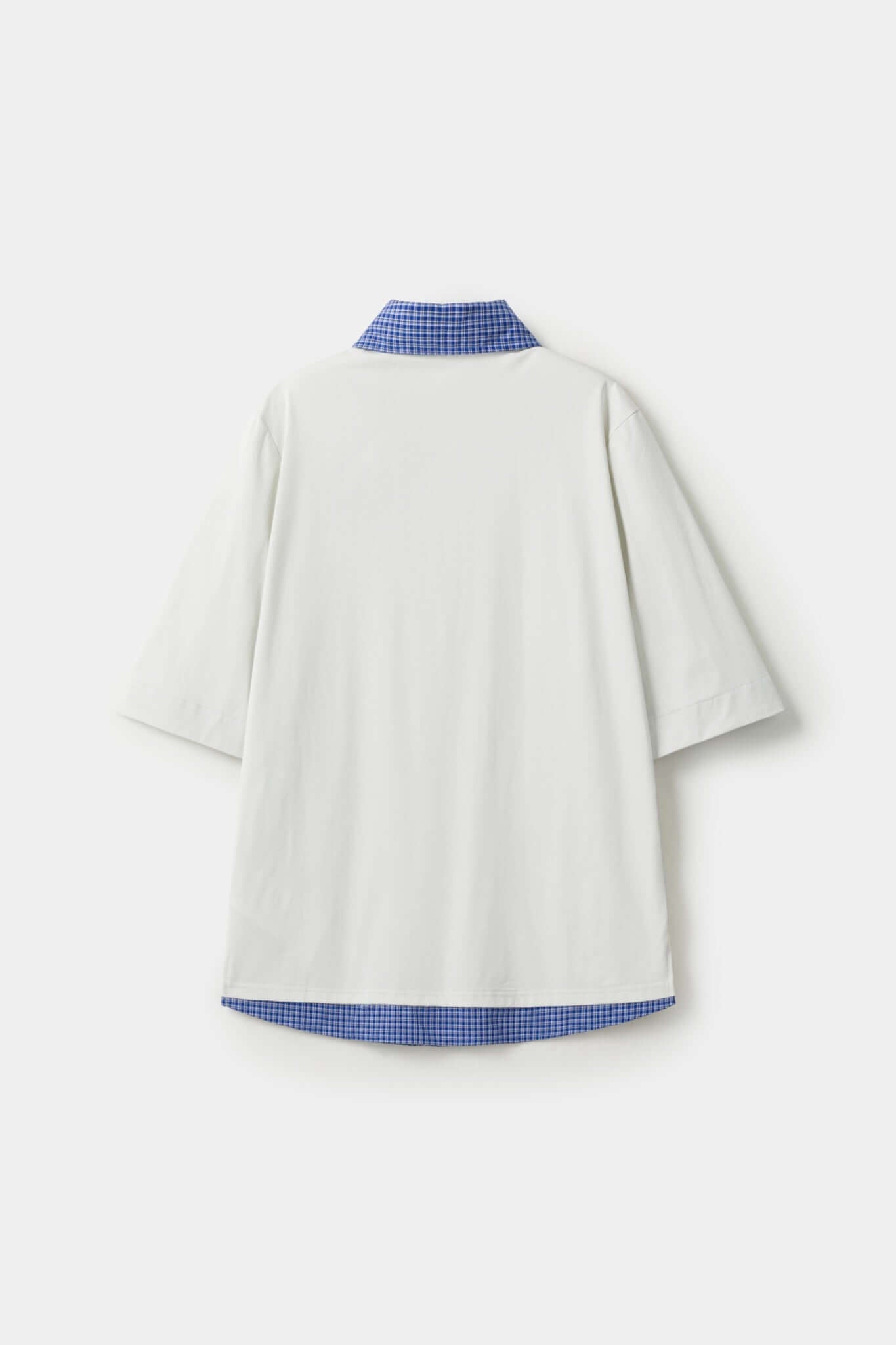 White polo shirt with checkered collar and sleeves
