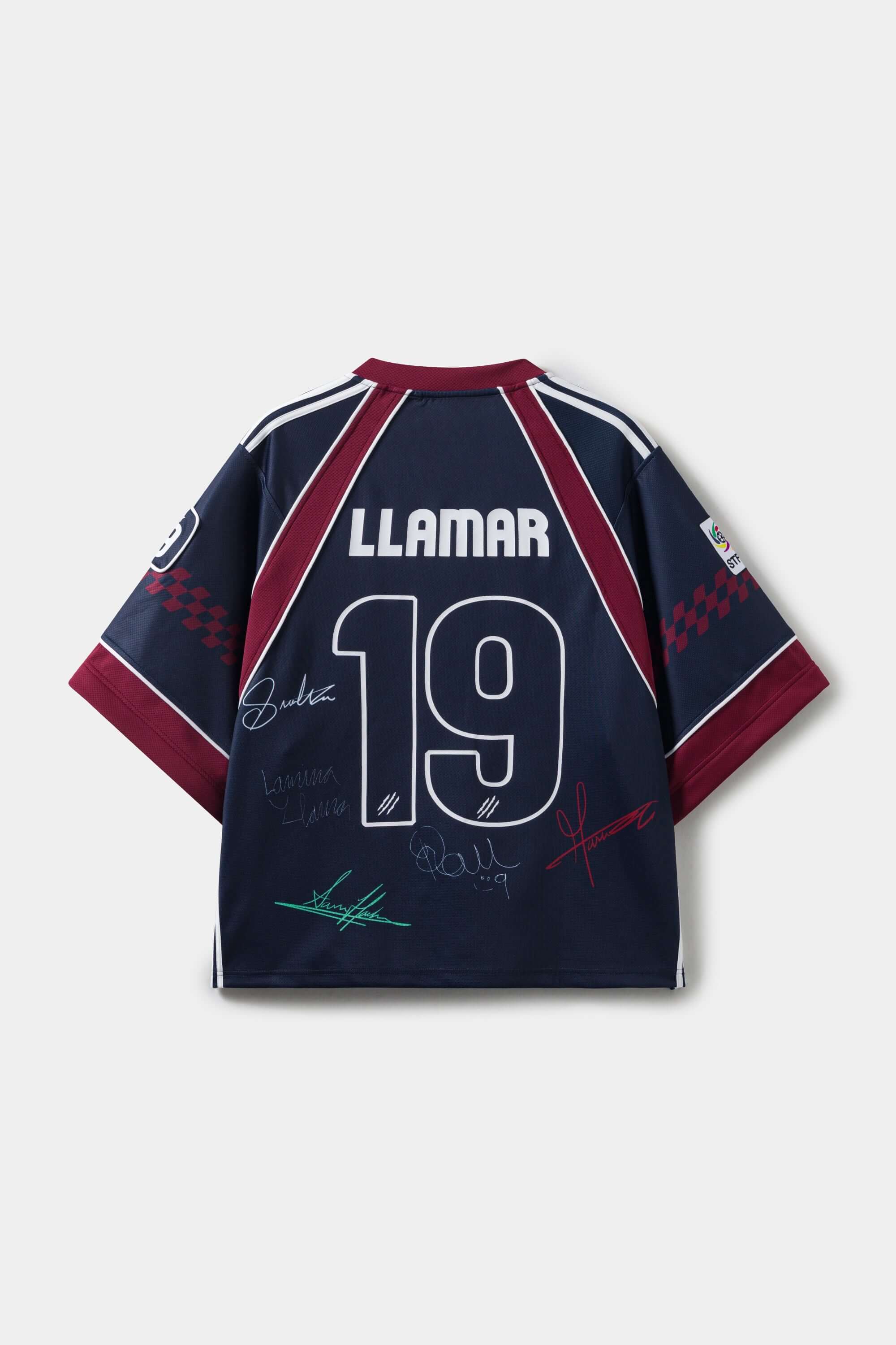 Navy sports jersey signed, with red accents and 'LLAMAR' and '19' branding on a white background