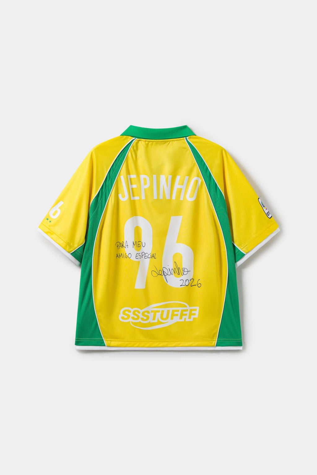 Yellow and green sports jersey with 'Jepinho' and '96' signed on a white background