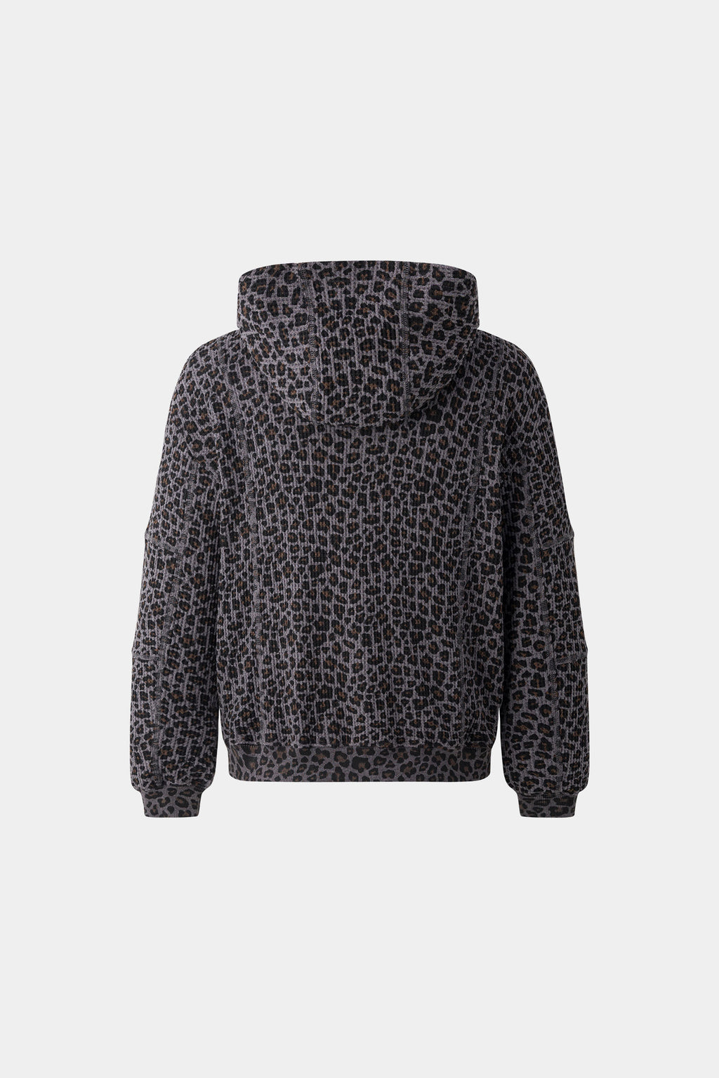 Leopard print zip up with a red label on a light gray background