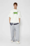 Grey wide-leg pants with a walkman belt on a grey background