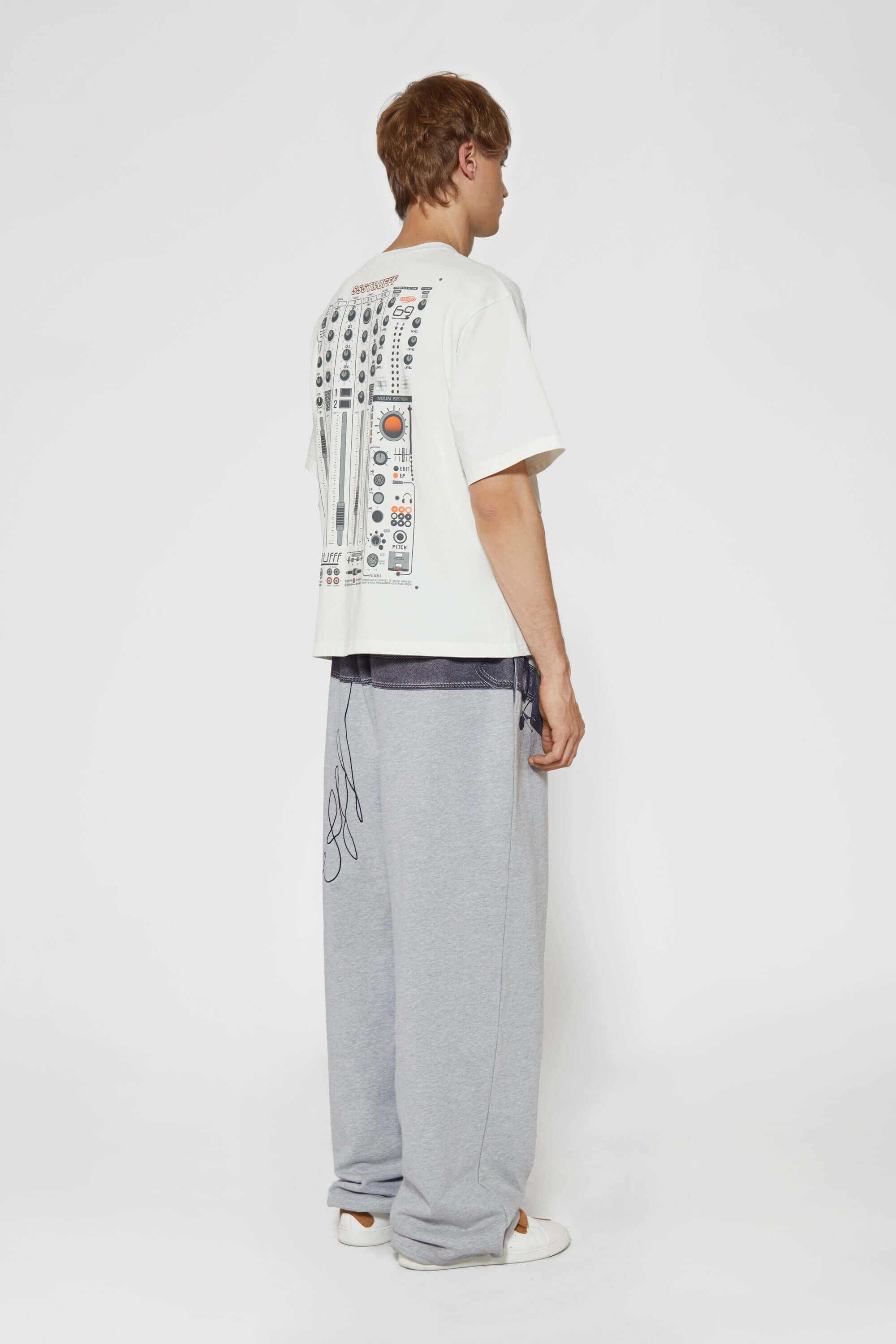 Gray wide-leg pants with a walkman belt on a grey background