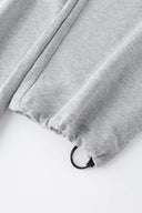 Gray wide-leg pants with a walkman belt on a grey background