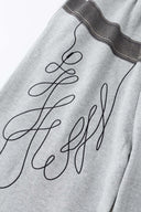 Gray wide-leg pants with a walkman belt on a grey background