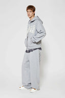 Gray hoodie with 'SSSTUFF' that changed color with UV light