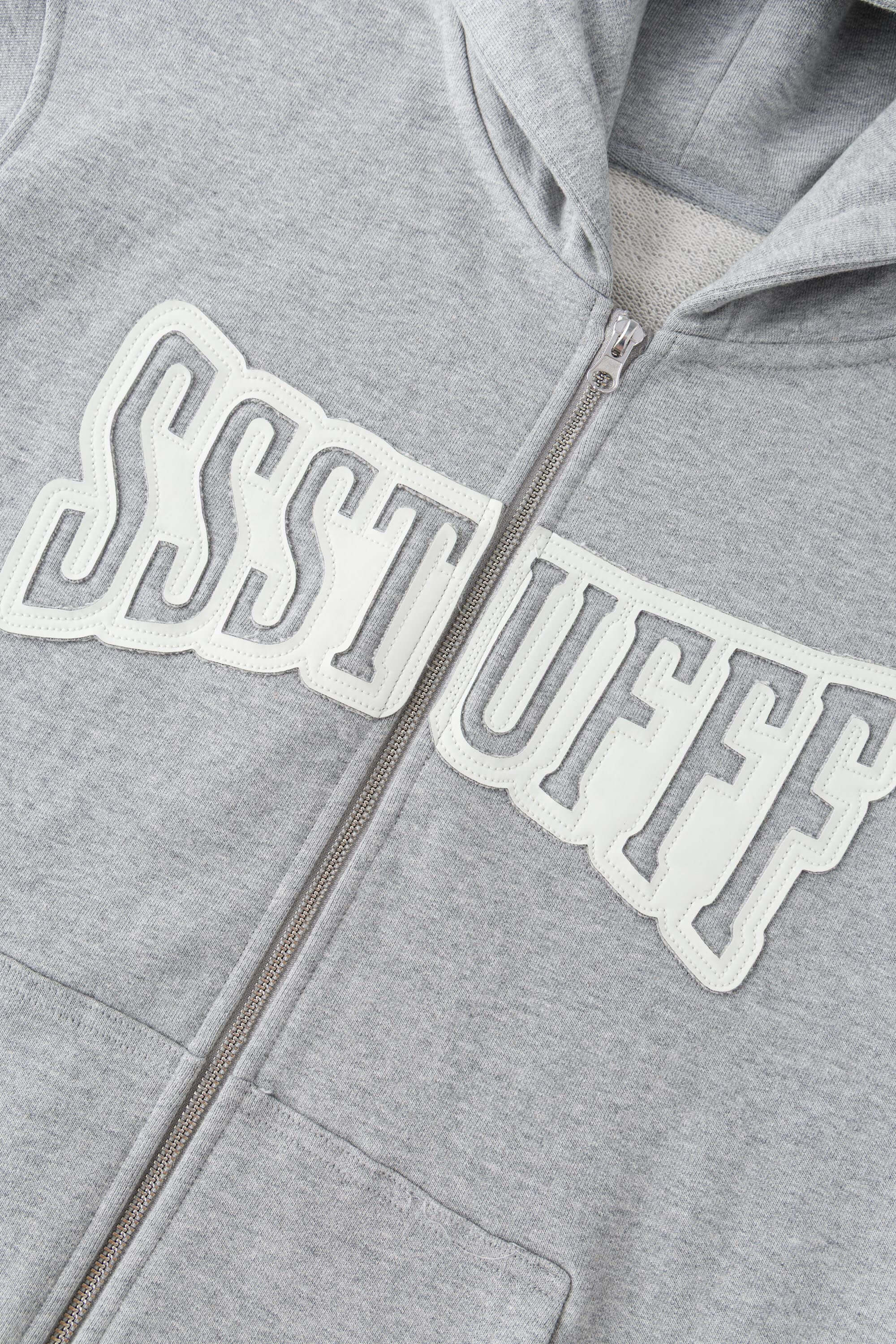Gray hoodie with 'SSSTUFF' that changed color with UV light
