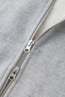 Gray hoodie with 'SSSTUFF' that changed color with UV light
