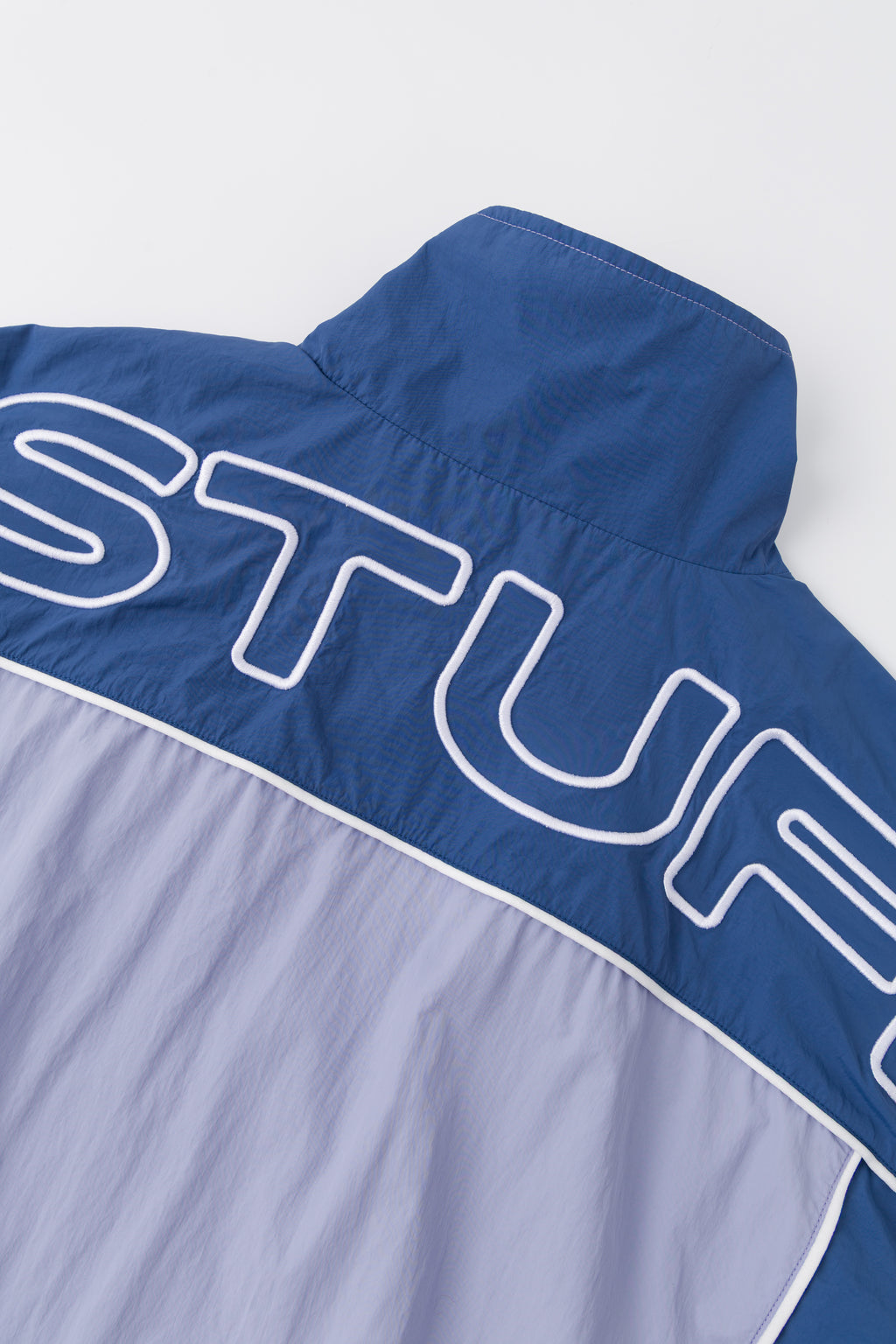 Close-up of the outline STUFF lettering at the back.