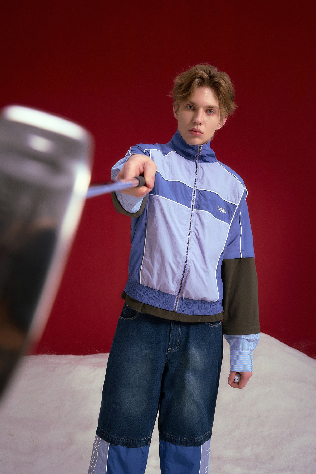 3 in 1 Detachable Layered Track Top in periwinkle blue, with sleeves and layers that zip off into three pieces. Worn on a model, waist-up view.