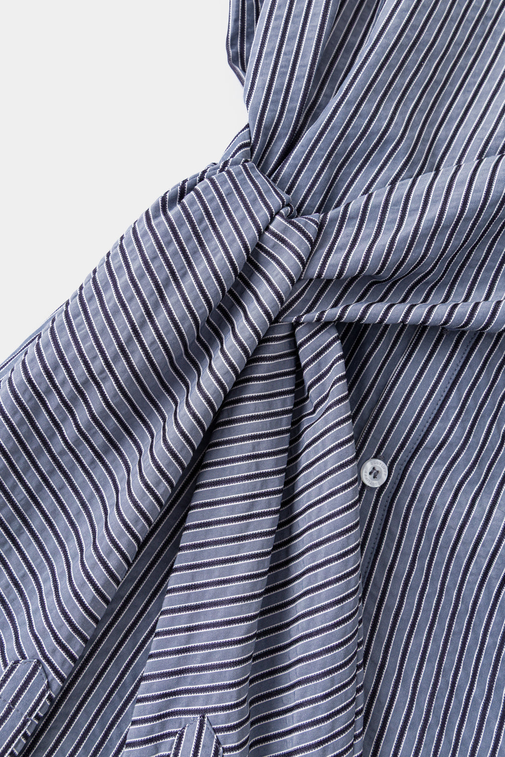 Detail of the second pair of sleeves knotted across the front.