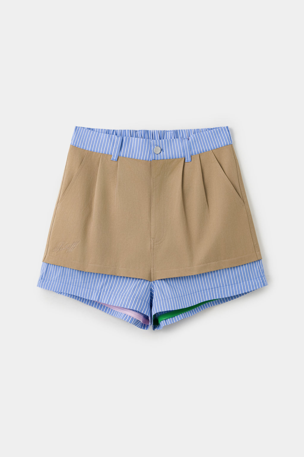 The 5 in 1 Layered Pants with the lower layers removed, worn as khaki shorts.
