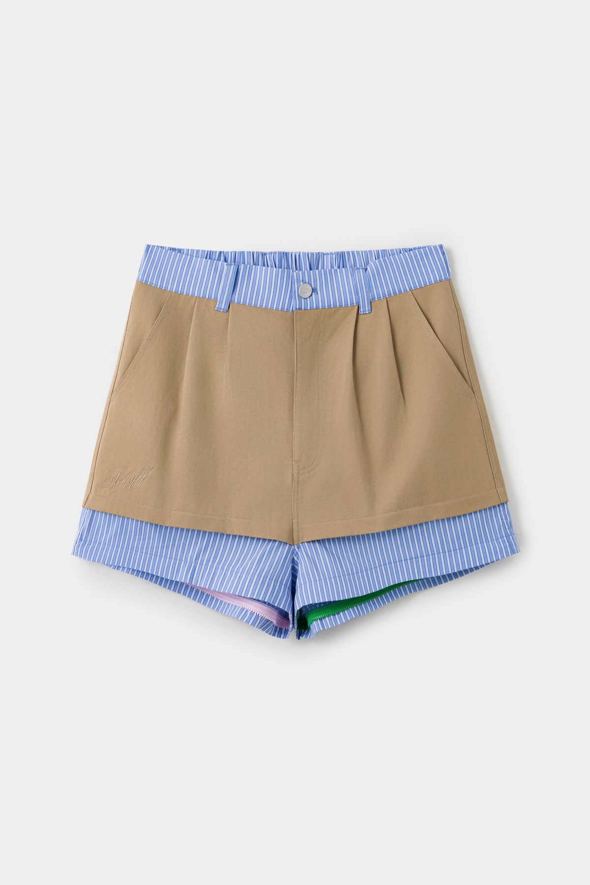 The 5 in 1 Layered Pants with the lower layers removed, worn as khaki shorts.