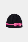 Bow Beanie in black, wrapped in pink bow tape with the bow tied at the front.