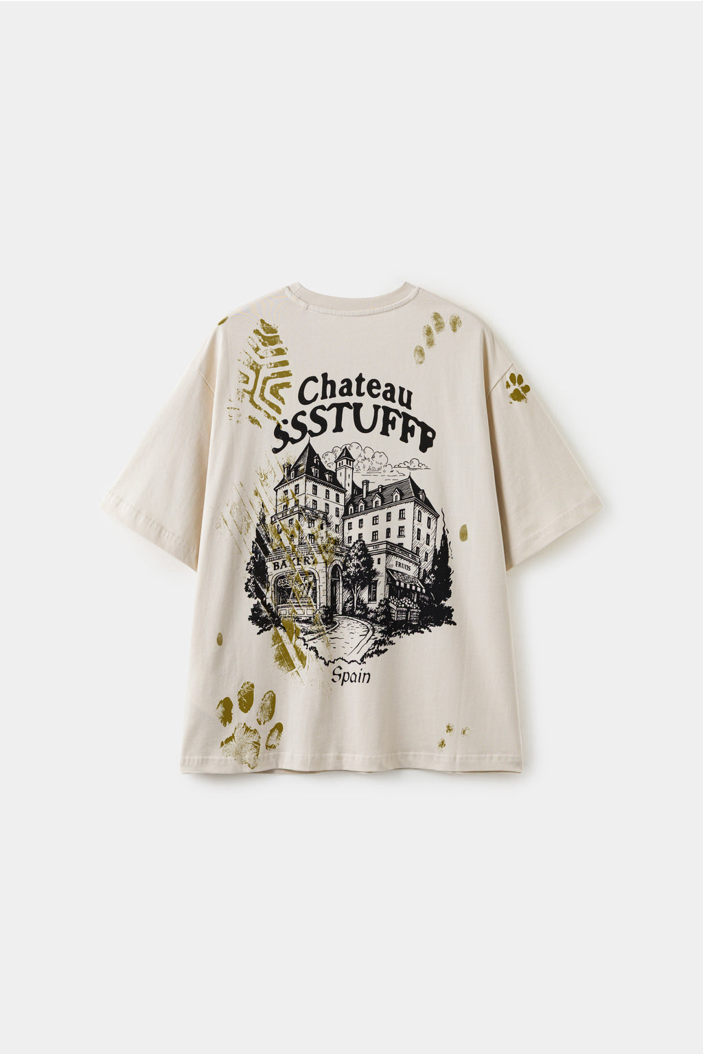 Back of the tee under UV light, with olive footprints, paw prints and leaves revealed around the chateau print.