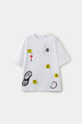 Crime Scene Tee in white with four yellow 3D evidence markers, a bullet hole, blood, a shoe print and a ring stain.