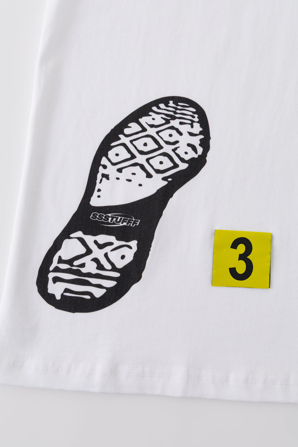 Close-up of the shoe sole print with SSSTUFFF lettering beside marker 3.
