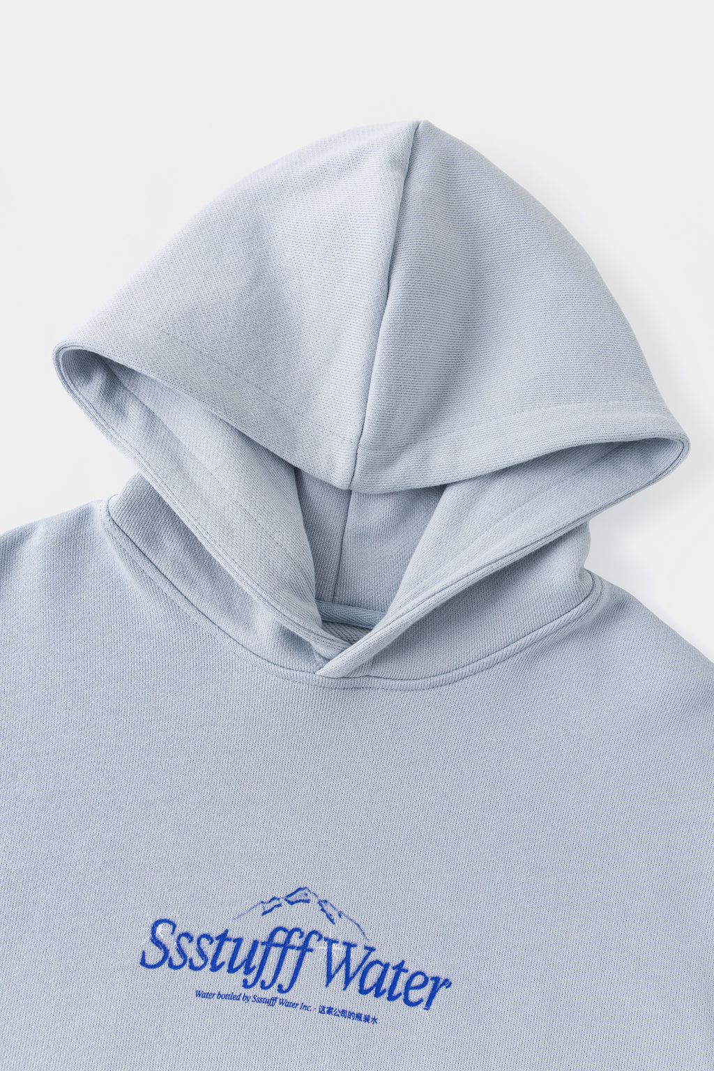 Close-up of the hood and the blue Ssstufff Water chest print.