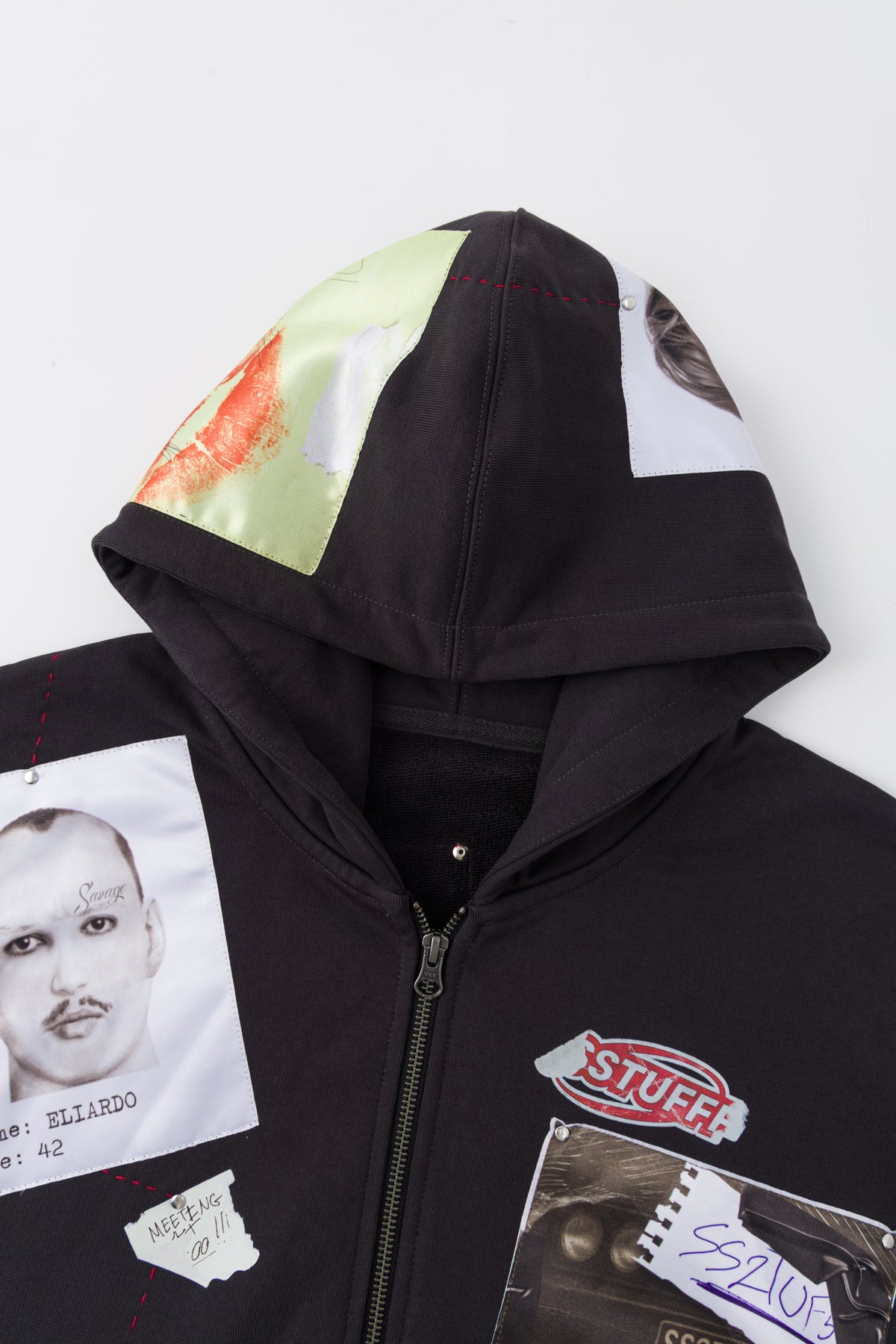 Close-up of the hood and the printed mugshot at the chest.