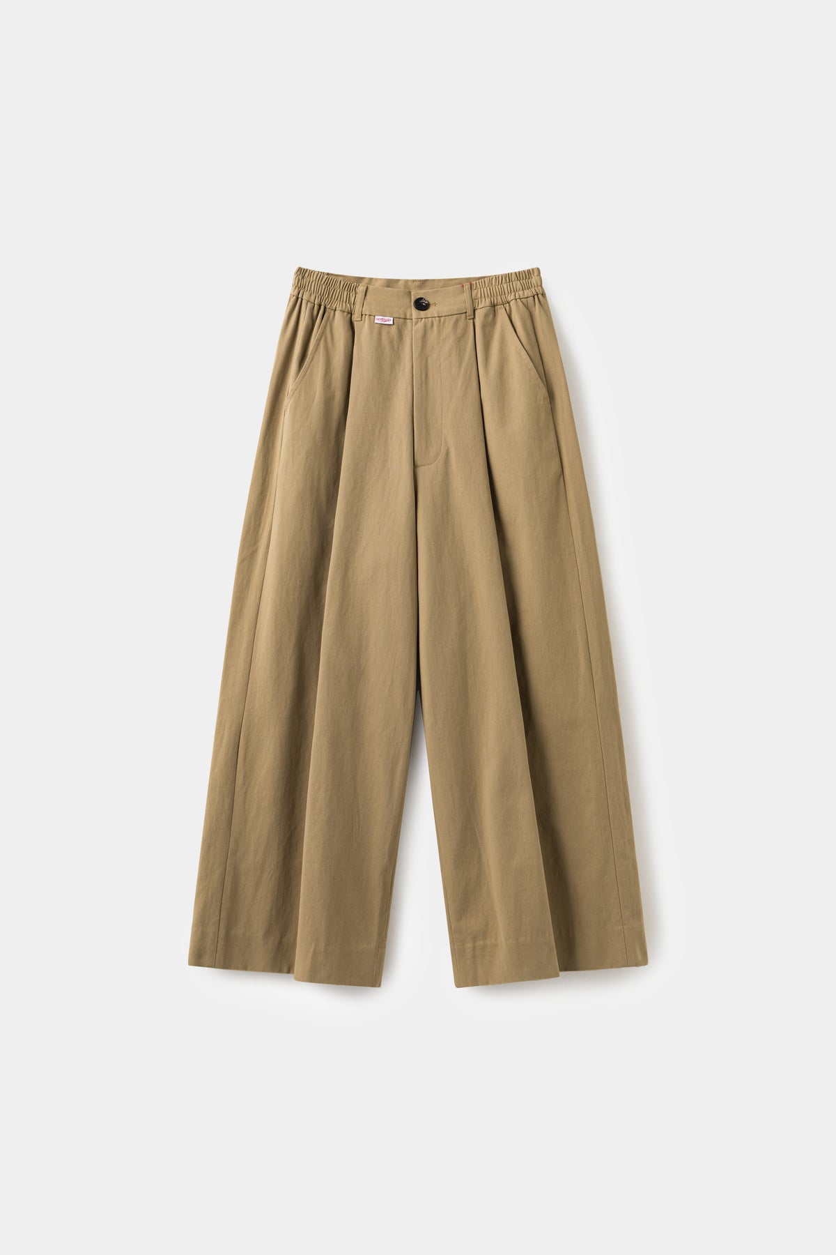 Dress Pants in beige, cut as an oversized pleated wide leg trouser.