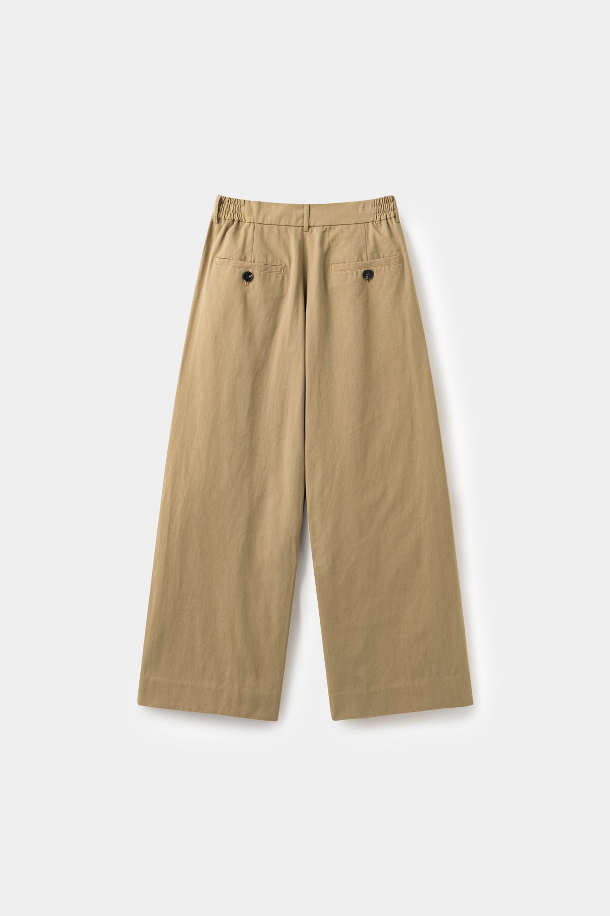 Back view of the beige wide leg dress pants, with a buttoned welt pocket.